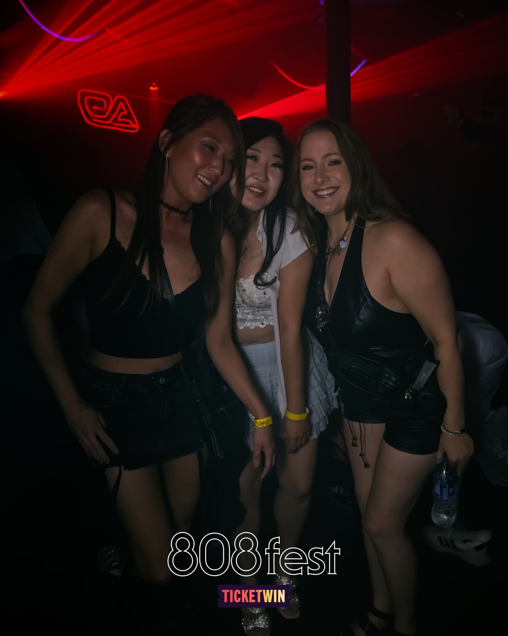 Four attendees on the floor at 808 Fest